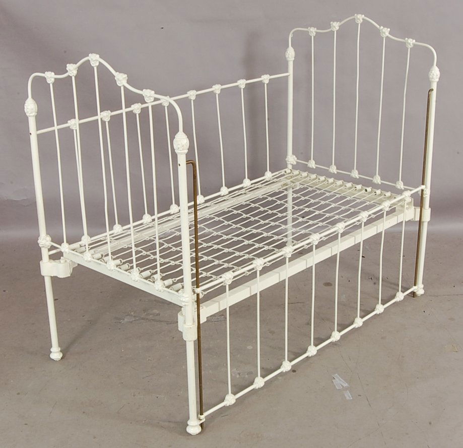 373 Victorian style cast iron drop side Baby Crib.