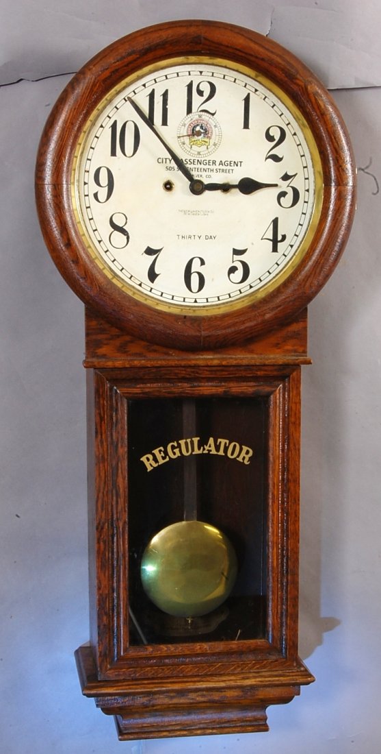 New Haven Oak Railroad Station Clock: Denver & Rio Grande Western. City Passenger Agent. 39" t x 15" w Thirty Day Movement. Ca. 1900