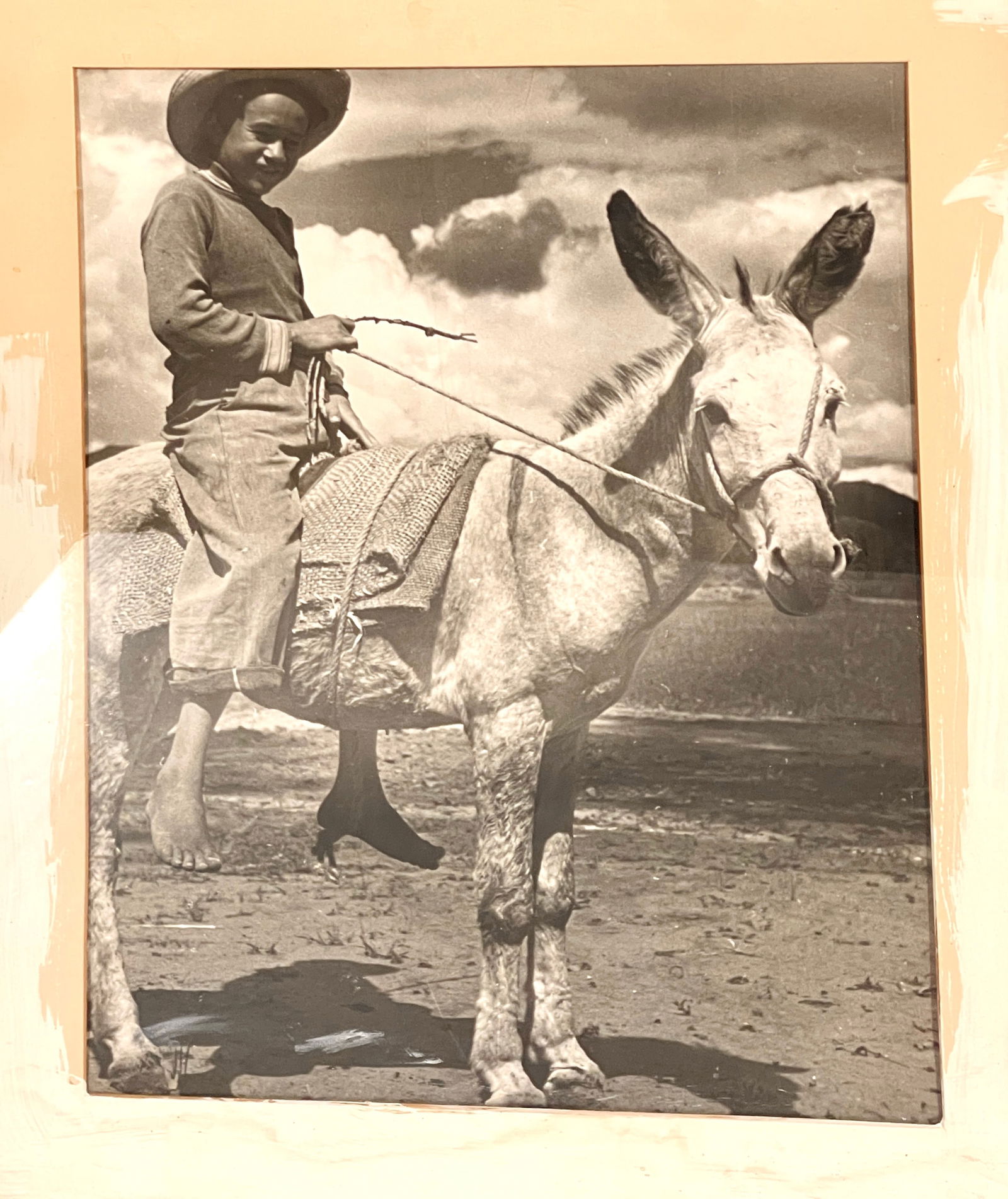Vintage Black & White Photo of a Boy: Riding a donkey, 18", circa 1920.