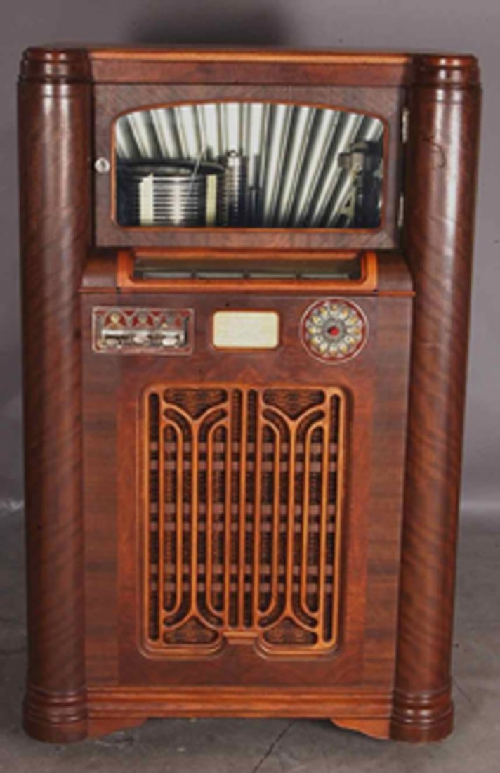 Wurlitzer Simplex Multi Selector Juke Box: in walnut case. Model 412. 51" t x 23" d x 31" w. Ca. 1930