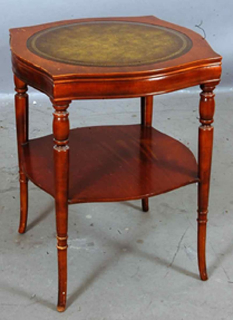 English Sheraton style Mahogany Lamp table: with leather insert top on turned legs. 26" t x 21" w. Ca. 1920