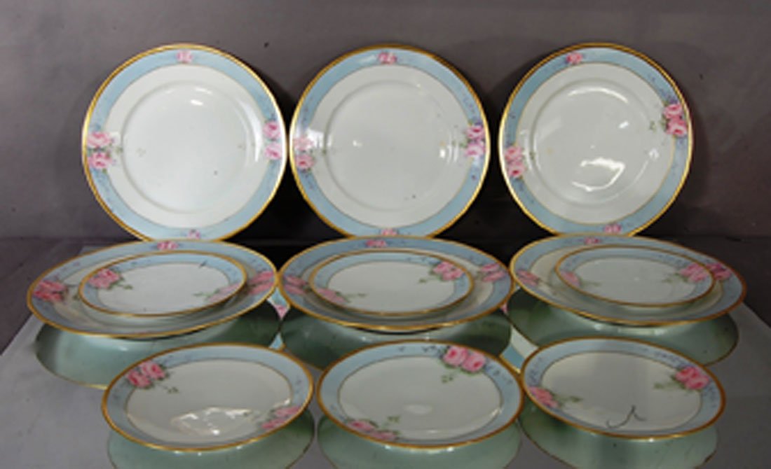 12 Pieces of Bavarian china: Hand painted roses with gold trim. 6 dinner plates 10" d, 6 small plates 7" d. Bavarian. Ca. 1900