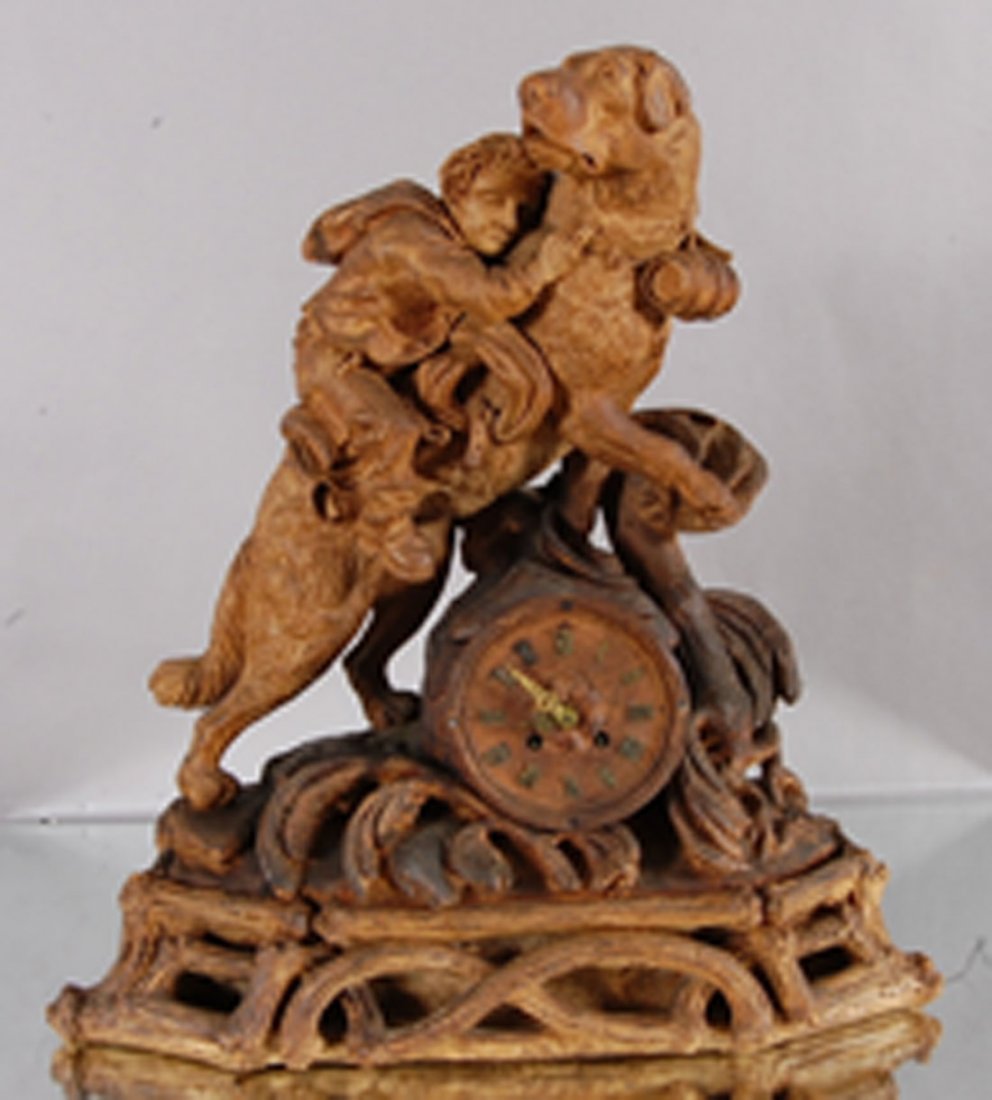 Black Forest Mantel Clock: With carving of Saint Bernard. Time & Strike. 18" t x 18" w x 6" d.
