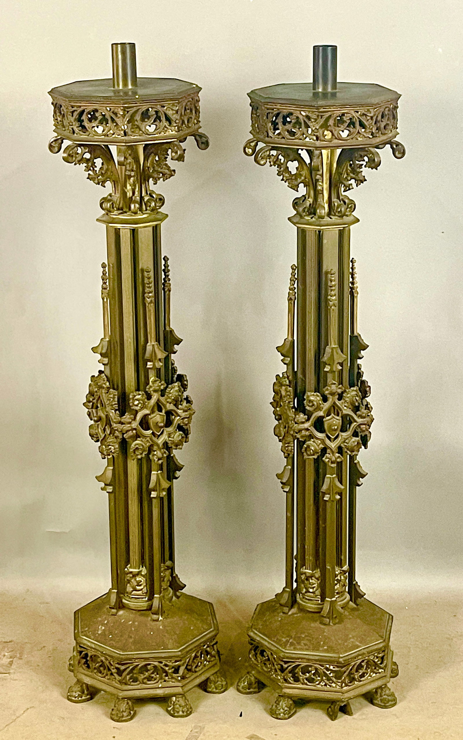 Pair of Torchiere Candle Holders: 19th century, French gothic, embossed and decorated top skird, decorated all the way down to the footed base, 42"t x 11"w, circa 1850.