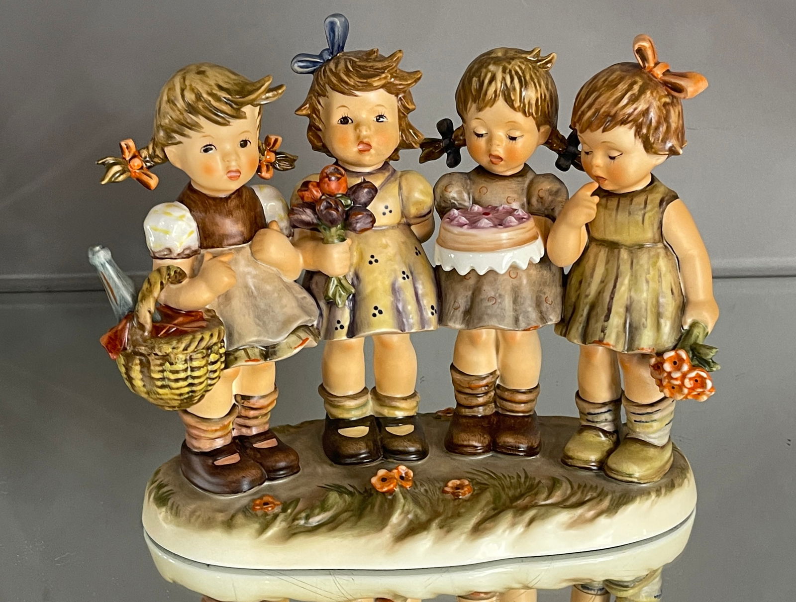 Hummel Figural: "We Wish You the Best", 8"t x 4"d x 9 1/2"w, West Germany, circa 1991.