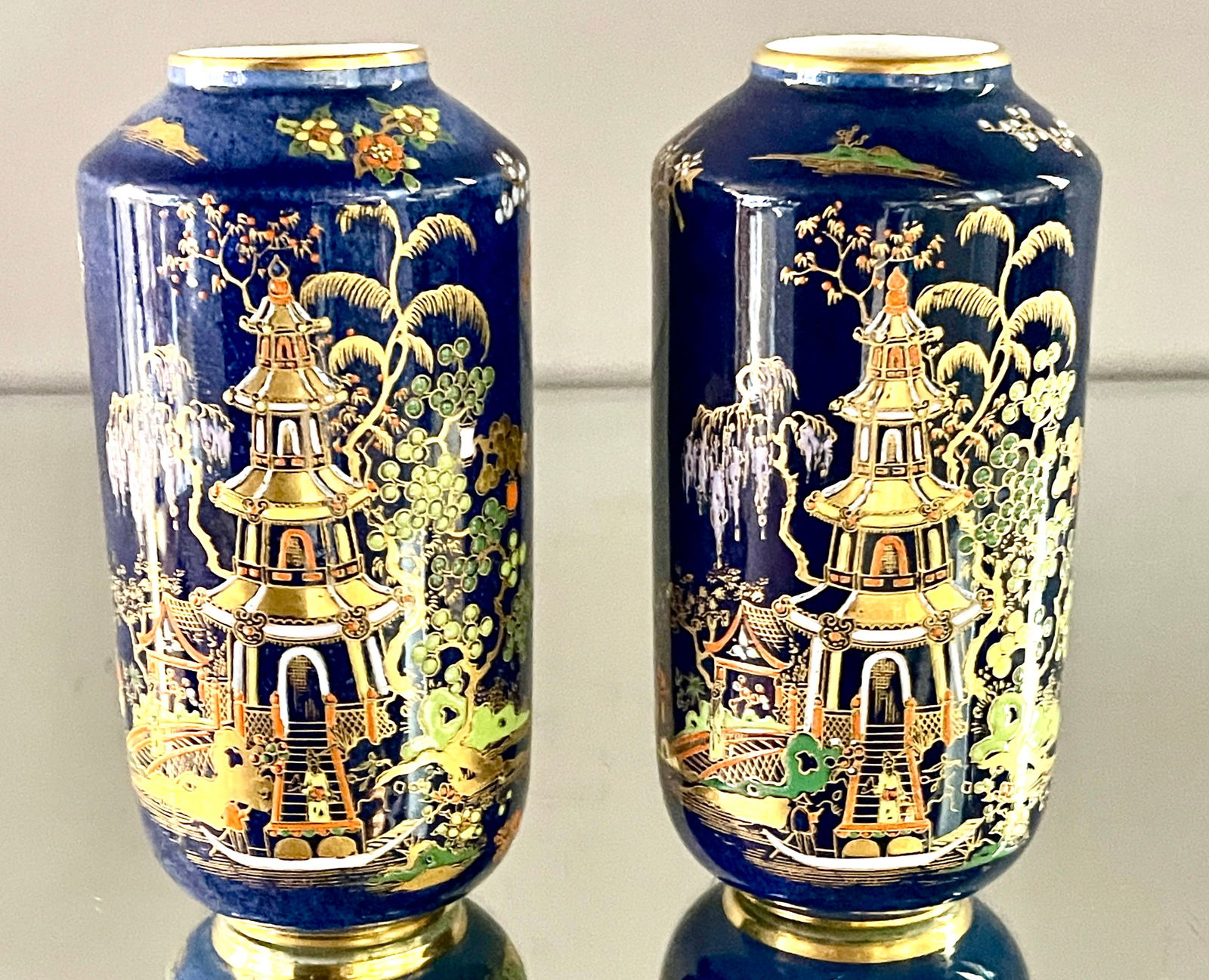 Pair of Vintage Carlton Ware: Dark cobalt blue, mottled background, Chinese scenery, marked on bottom, #2936, 6"t x 3"d.