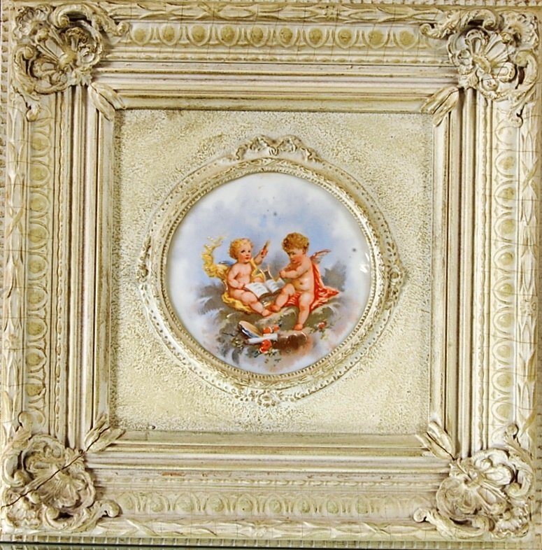 French Louis XV style Porcelain Plaque: With 2 cherubs playing music. Framed & Hand decorated. 14" x 15" Ca. 1920