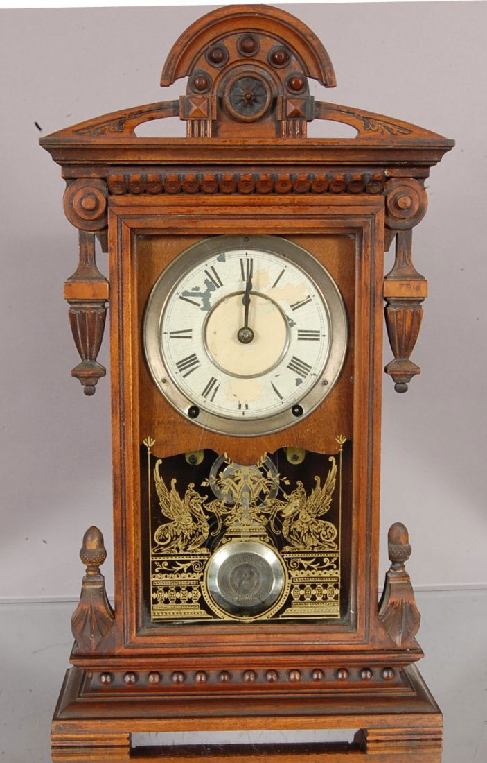 Seth Thomas walnut shelf clock: Original label on inside. Fancy case. 22" t x 13" w. Ca. 1880