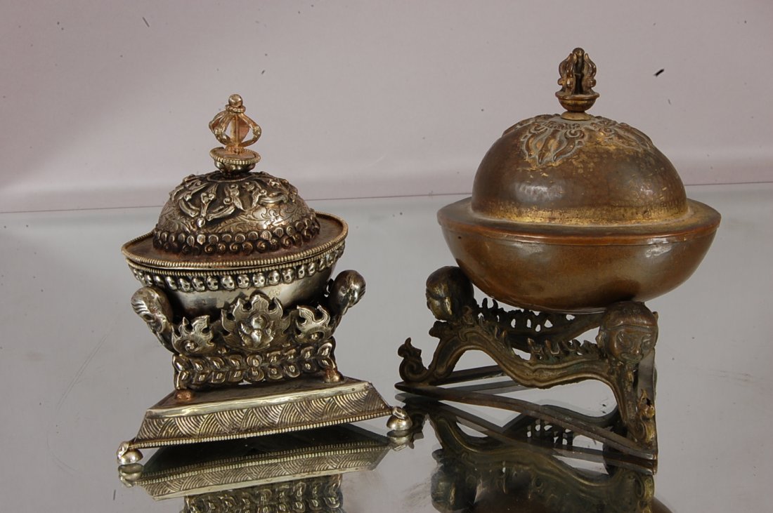 2 Oriental covered dishes and stand: One silver, one copper. 5" t. Ca. 1900