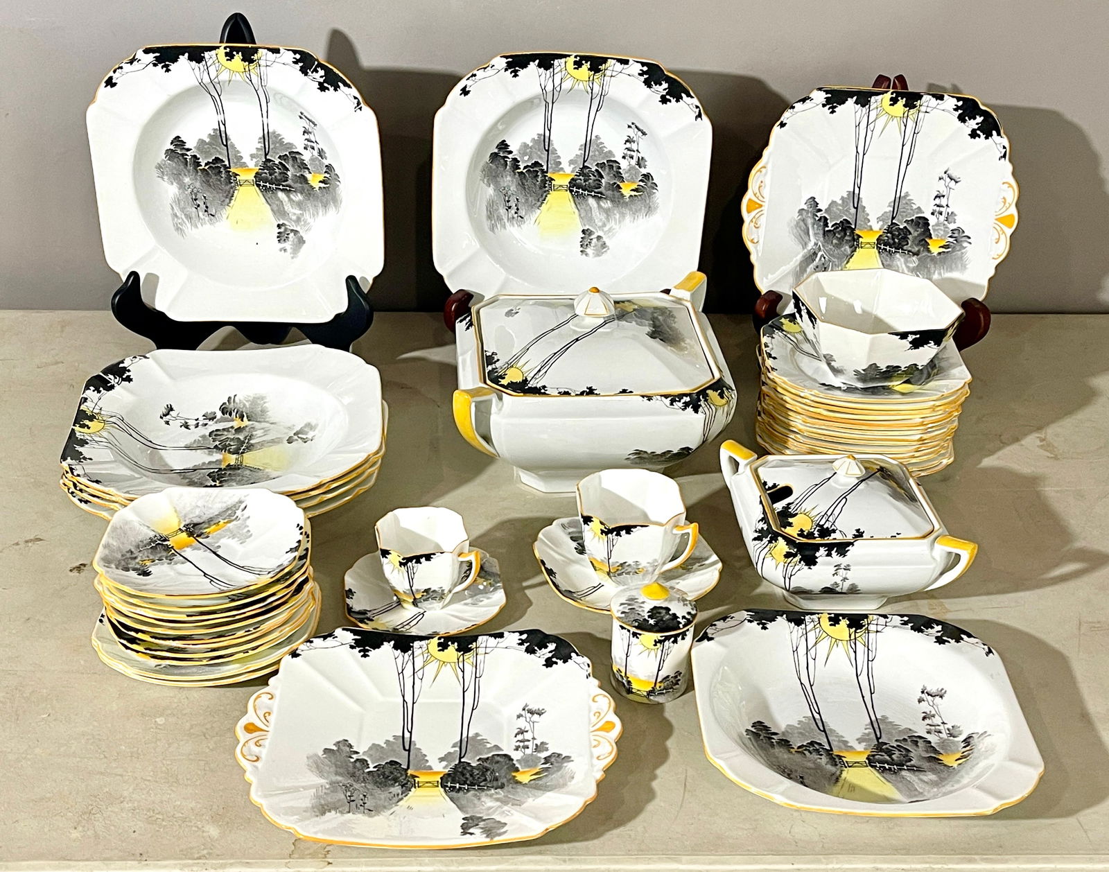 Shelley Art Deco Queen Anne Partial Dinner Set: Tall trees and sunrise, #1678, 40 pieces. ORIGIN: England CIRCA: 1920.