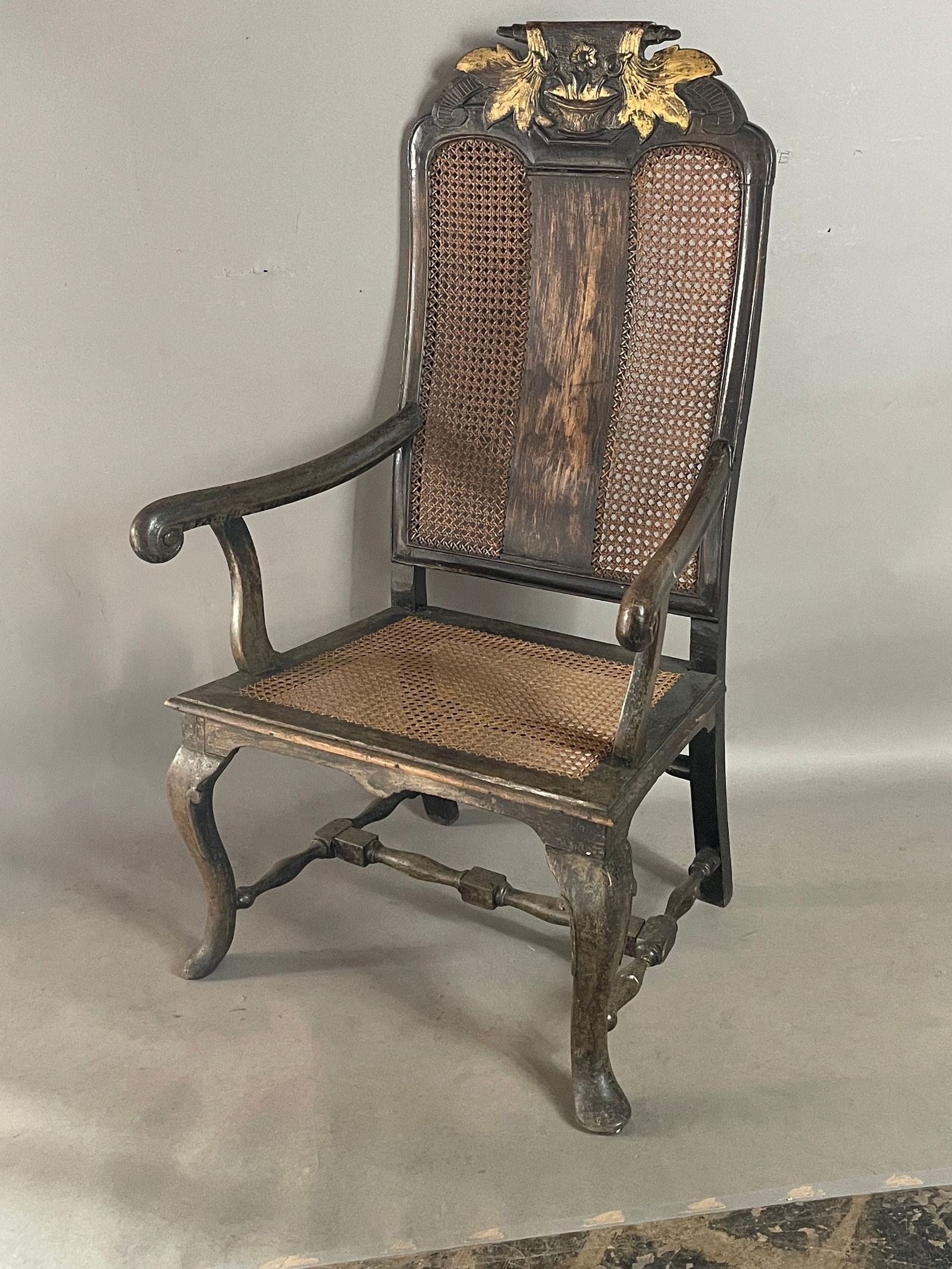 19th Century Arm Chair: Mortise and peg construction. DIMENSIONS: 48"t x 20"t x 28"w ORIGIN: England CIRCA: 1850.