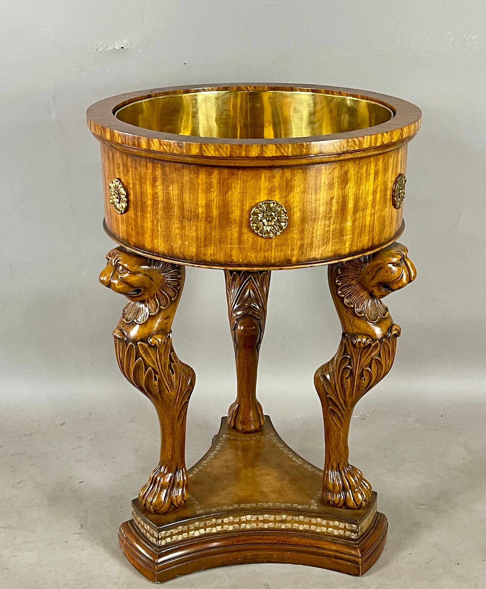 Maitland Smith Regency Style Cellaret Planter: Mahogany, three lions carved on footed legs. DIMENSIONS: 23 1/2"t x 23"w ORIGIN: USA CIRCA: 1980.