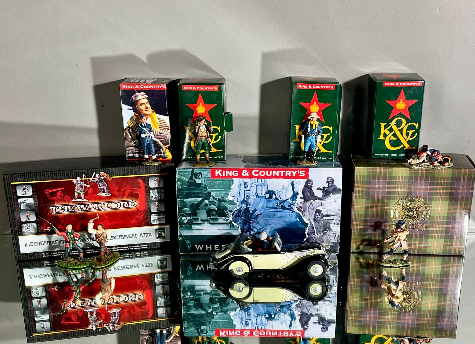 8 Miniature Metal Soldiers: 1 BMW car, 5 King & Country, 2 legends of the silver screen. CIRCA: 2010.