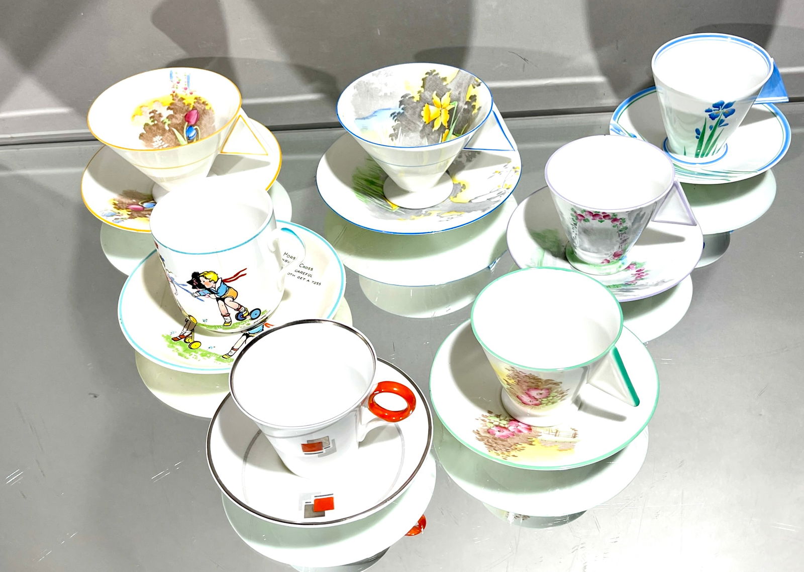 7 Shelley Tea Cup Sets: Art deco style. ORIGIN: England CIRCA: 1930.