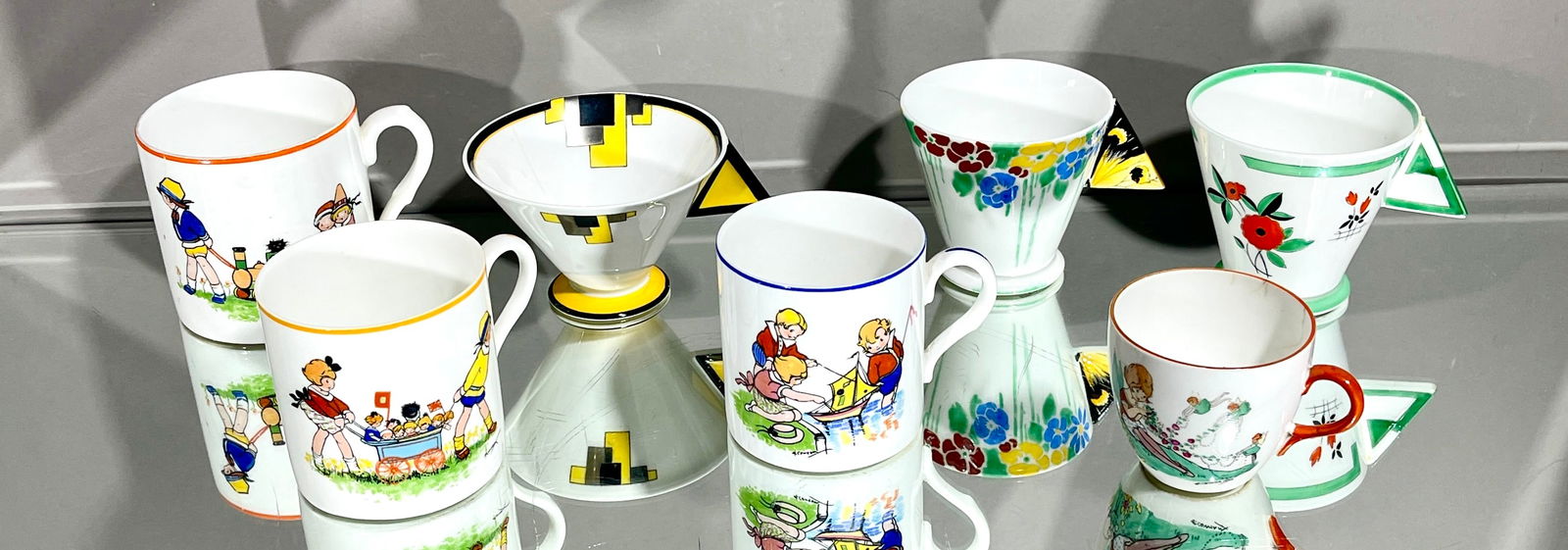 7 Shelley Art Deco Cups & Saucers: Various models. DIMENSIONS: 3 1/2", 3", 2" ORIGIN: England CIRCA: 1931.