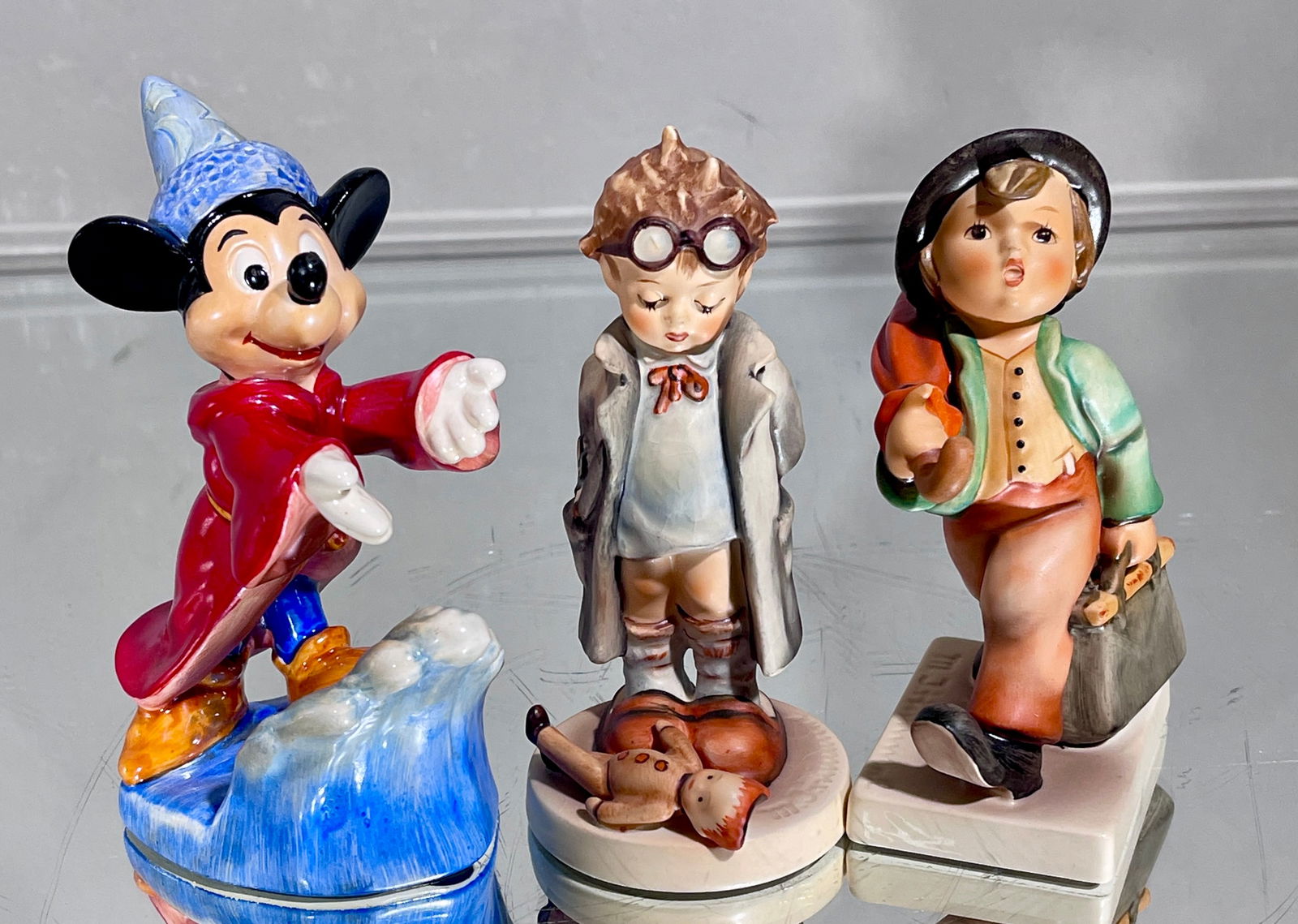 3 Goebel Hummels: 5" Merry Wonderer, 4 1/2" doctor, 5 1/2" Mickey Fantasia ORIGIN: W. Germany CIRCA: 1950.