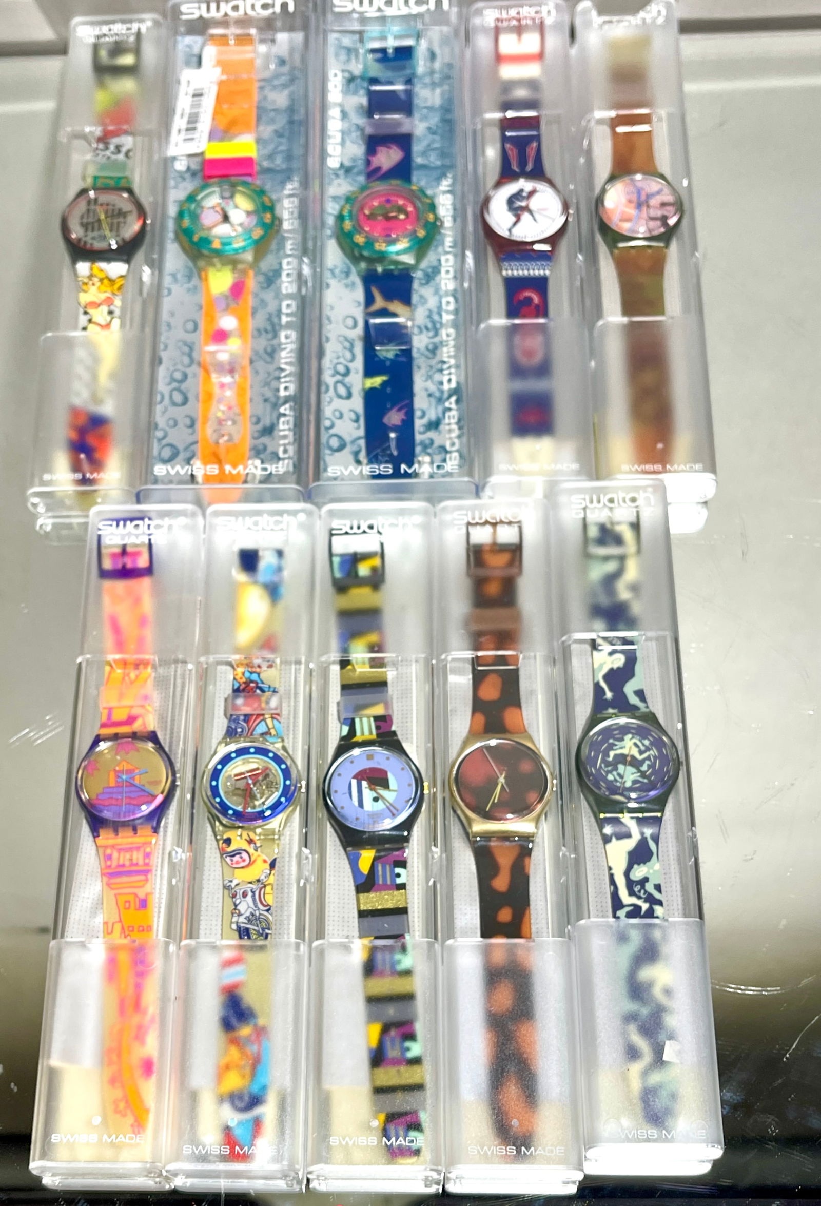 10 Swatch Quartz Collector Wrist Watches: ORIGIN: Switzerland CIRCA: 1990.