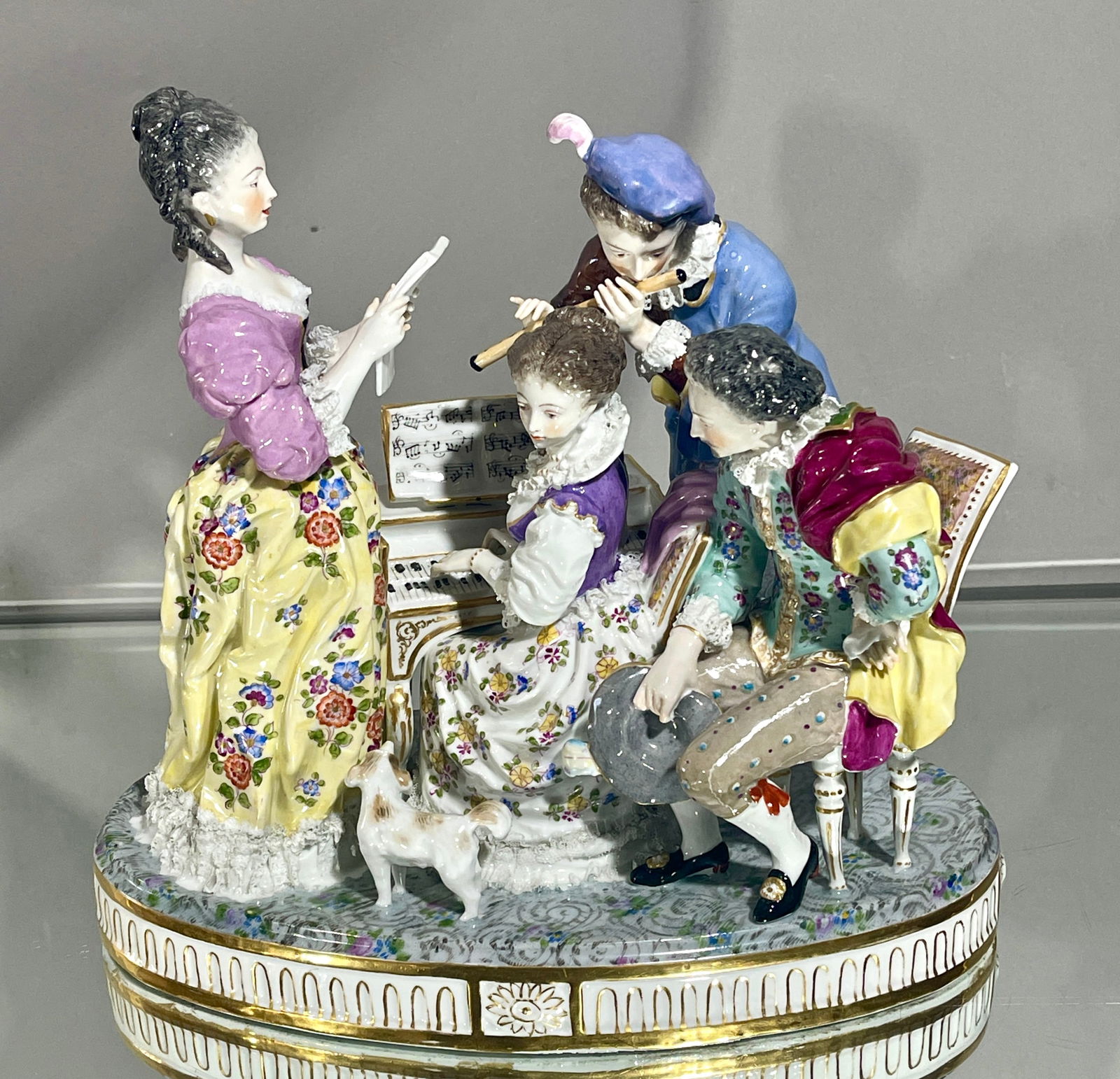 Meissen Porcelain Group: Model #108, 4 musical figures. MARKS: marked on bottom DIMENSIONS: 12"t x 7"d x 13 1/2"w ORIGIN: Germany CIRCA: 1950.