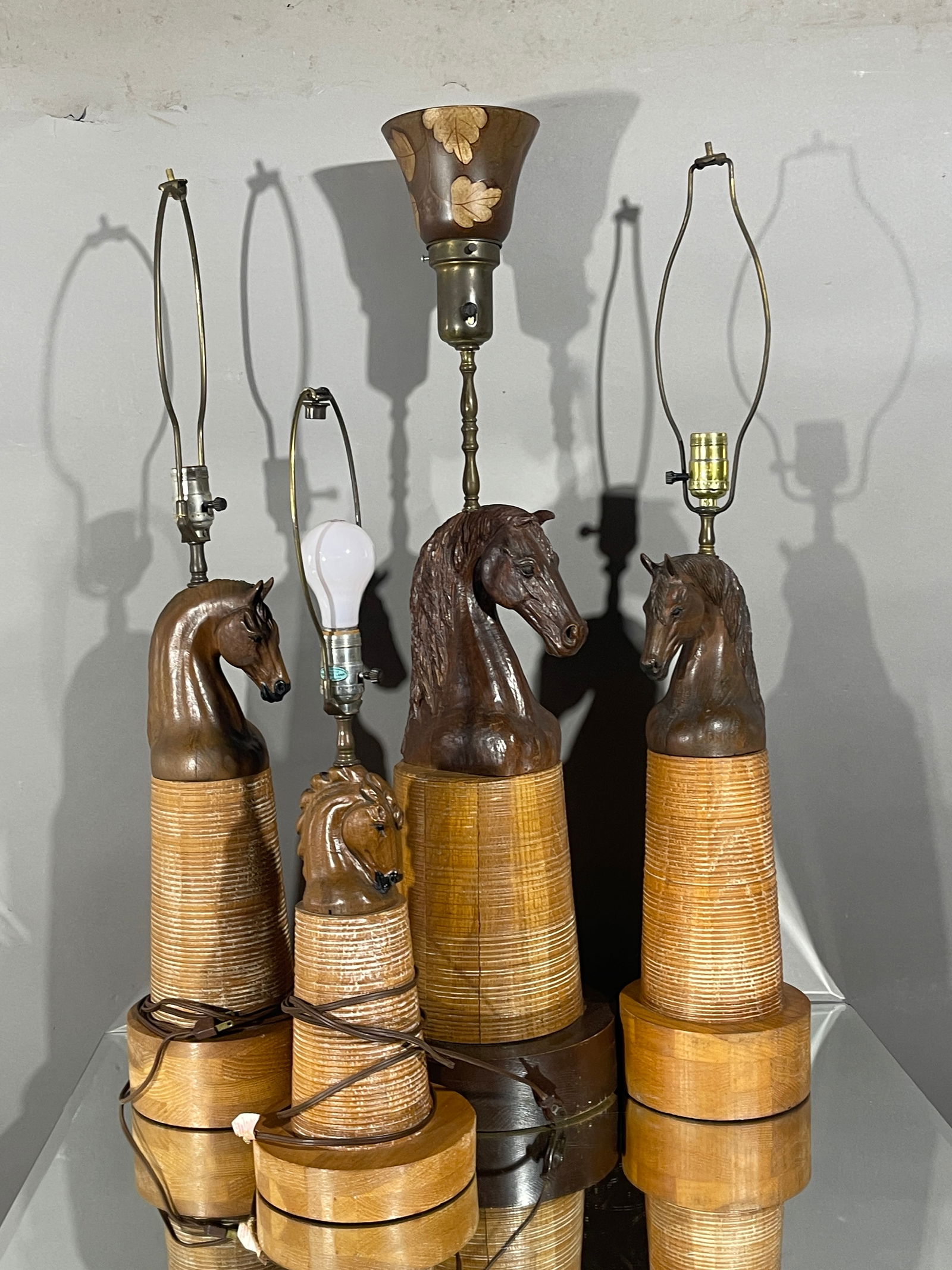 2 Vintage Wooden Horse Lamps: By August Brandt for Ranch Oak Foundation DIMENSIONS: 30”-10” , 25”-7”. lCIRCA: 1960.