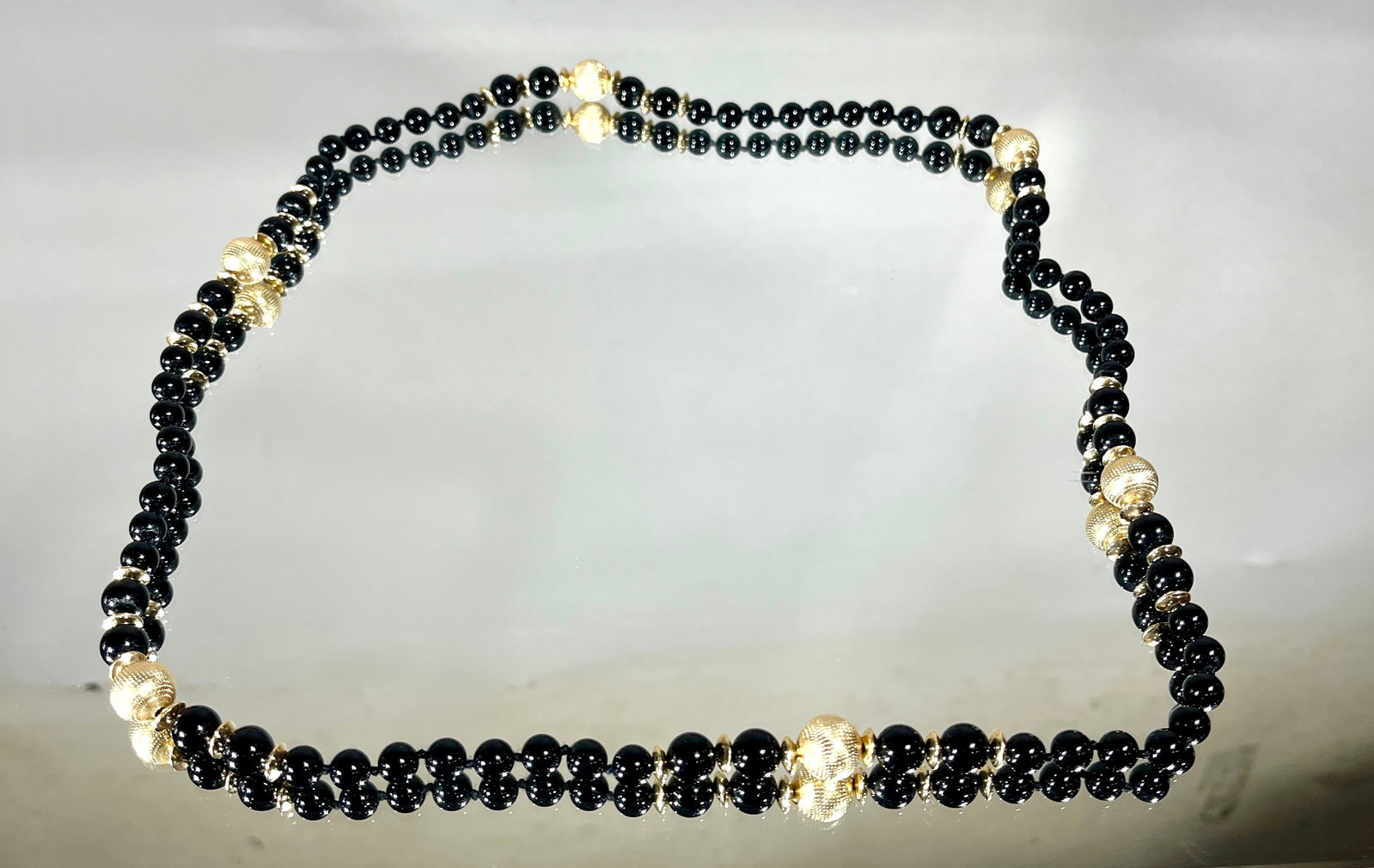 Vintage Onyx and Gold Bead Necklace 32": Total weight 81 grams. Circa 1960.