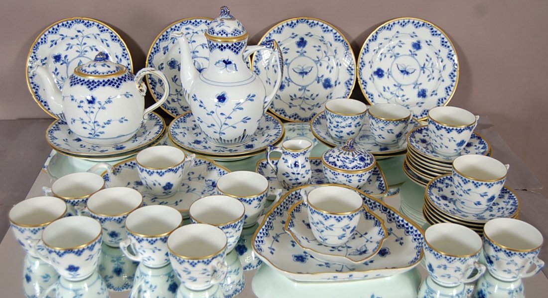 B & G Copenhagen porcelain 53 pc. Dessert set: Cobalt blue floral & butterfly decoration with gold trim Signed on bottom B & G. Ca. 1960