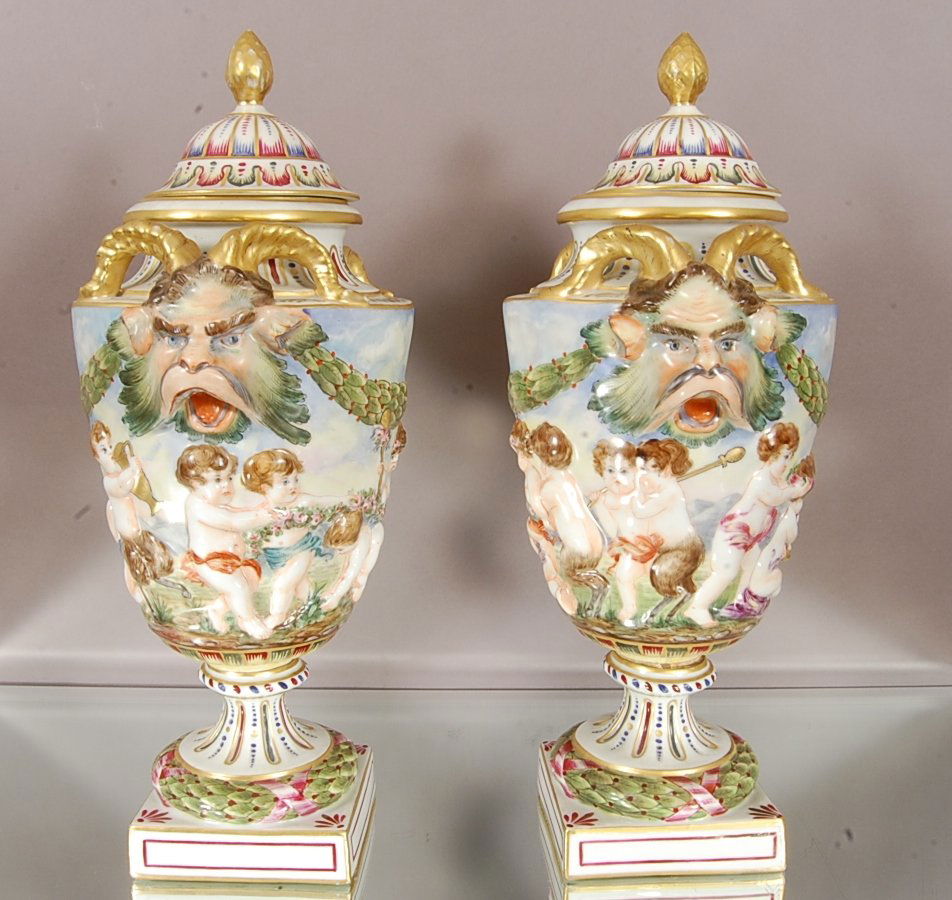 Pair of Capodimonte Urns: Signed on bottom 15" t x 7" d. CA. 1920