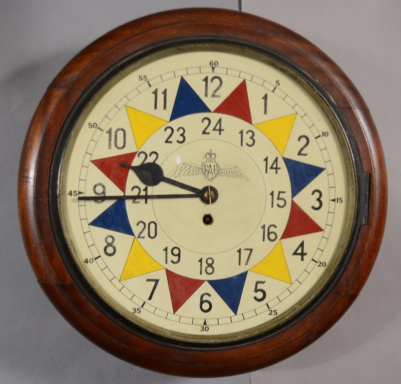 W.W. II R.A.F. Operations Room Clock: Signed Elliot, Fusee movement. 18 1/2" diameter, 14" dial. Ca. 1941. All incoming reports of enemy aircraft approaching which were received from outlying observation posts would be colour coded with f