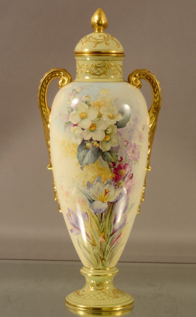 Royal Bonn Urn: Floral decorated. 2 handled with gold trim & lid. Signed on base Royal Bonn Germany. 16" t. Ca. 1890