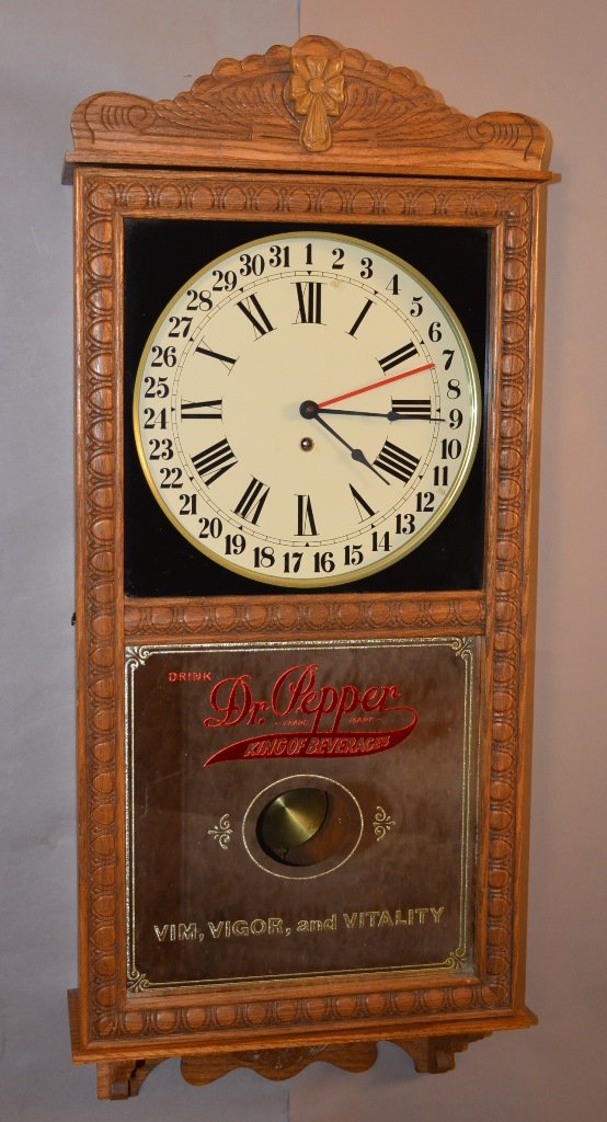 Dr. Pepper Advertising clock: With calendar dial. Time & strike. Promotional clock given to distributors. Wisconsin Clock Co. 37" t. Ca. 1960