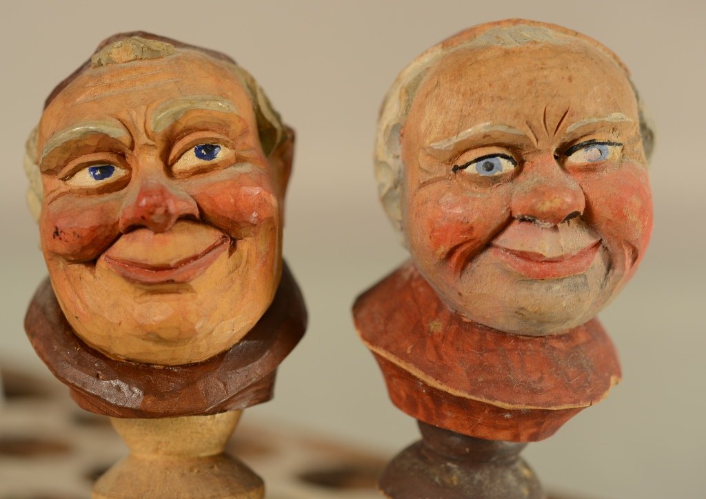 2 Black Forest Carved Wooden Bottle Stoppers: Measures 5". Circa 1900.