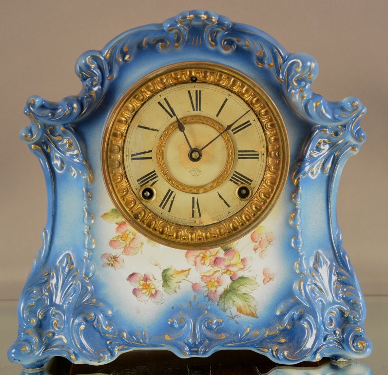 Ansonia "Tillbury" Model Porcelain Mantel Clock: Ansonia "Tillbury" Model Porcelain Mantel Clock. Floral decorated blue case. Time & Strike 10"h X 10"w ca. 1890