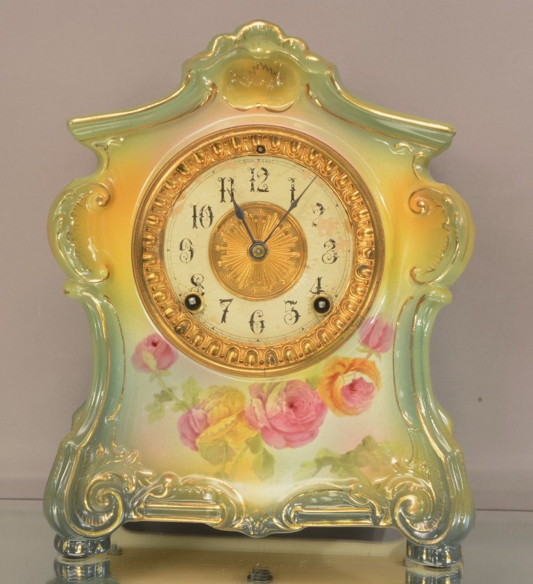 Ansonia "La Fontaine" Model Porcelain Mantel Clock: Ansonia "La Fontaine" Model Porcelain Mantel Clock. Royal Bonn Case. Signed on Back. Time and Strike. 11"hX9"w ca. 1895