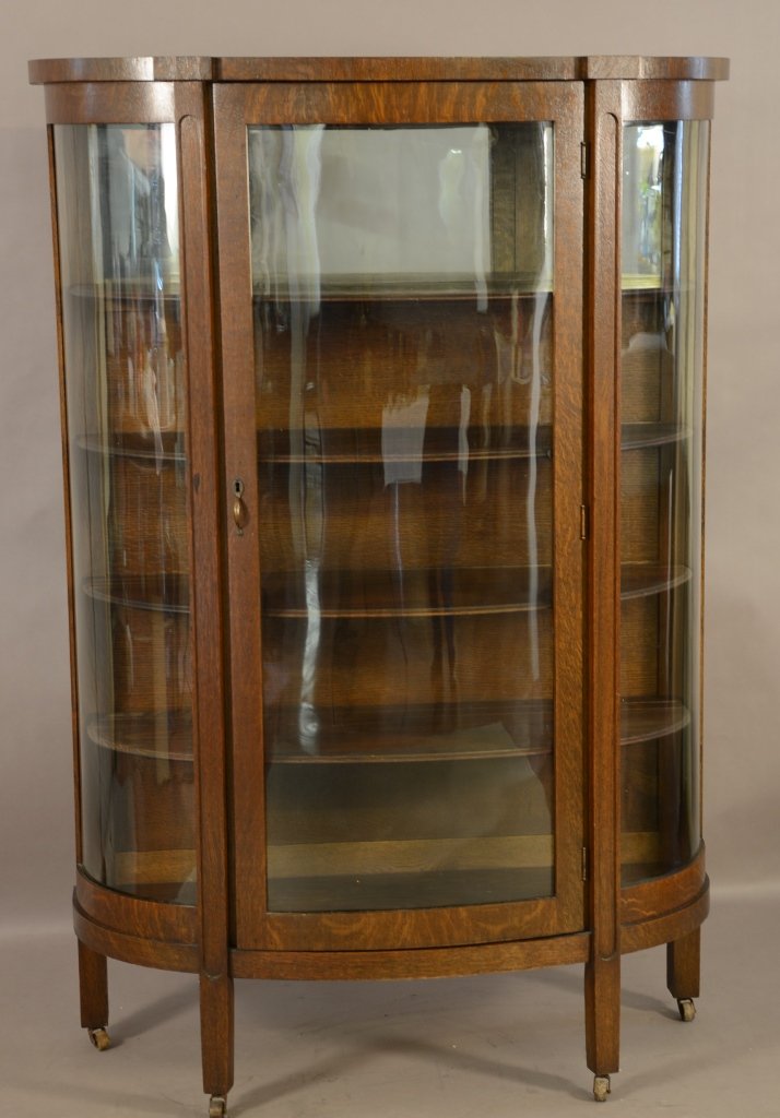 Turn of the Century Oak Carved Glas China Cabinet: Turn of the Century Oak Carved Glas China Cabinet with Original Shelves. 61"hX17"dX42"w ca. 1900