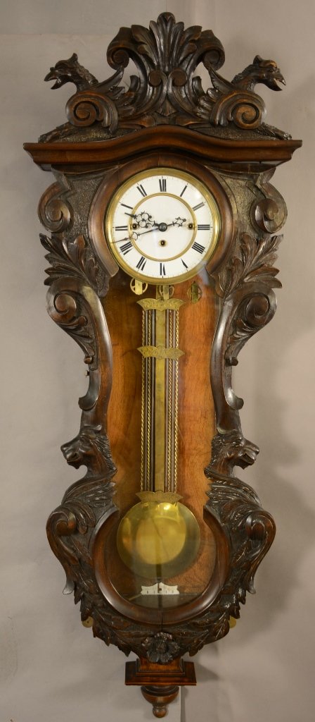 Black Forest Style Gustav Becker Wall Clock: Black Forest Style Gustav Becker,Three Weight Wall Clock. Carved Crest and Sides. Works Signed Gustav Becker 48"h ca. 1885