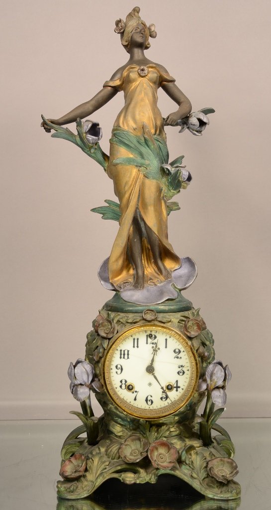 Ansonia Figural Mantel Clock of Woman: Ansonia Figural Mantel Clock of Woman with Flowers. Good Original Patina. Porcelain Dial. Time & Strike. 24"hX9"w ca. 1890