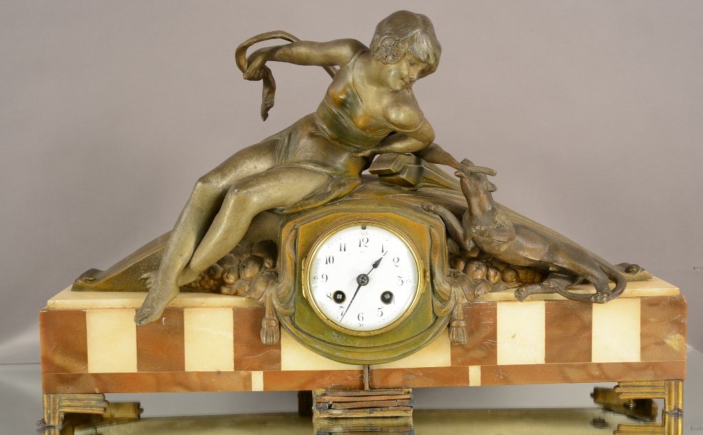 French Art Deco Style Figural Mantel Clock: French Art Deco style figural mantel clock of woman with tiger on marble base. Spelter statue. Porcelain dial. Works signed F & C. Time and strike. ca. 1910. 13" tall x 21" wide