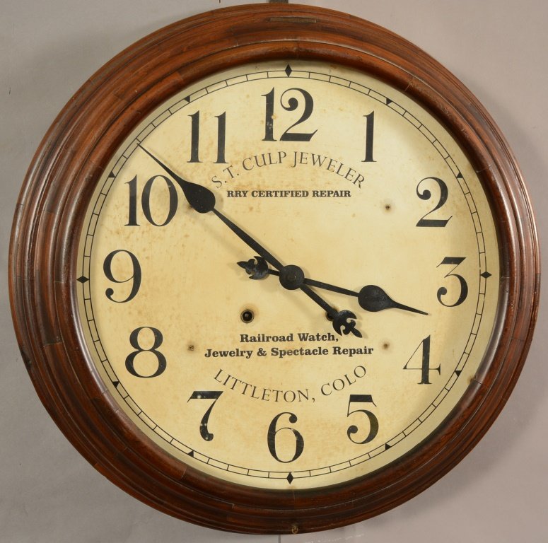 Sessions 23" Large Galley Clock: Session 23" large galley clock. Walnut case. Time only. S.T. Culp advertising clock. RRY certified repair. Railroad watch, jewelery, & spectable repair. Littleton, Colorado.Original paper label on bac