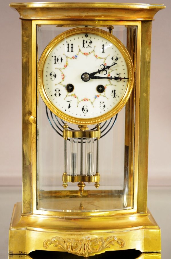 French Bow Front Crystal Regulator: French bow front crystal regulator with decorated porcelain dial. Beveled glass on all sides. Bow front door. Time and strike. Marked France. ca. 1900. 12" x 7"