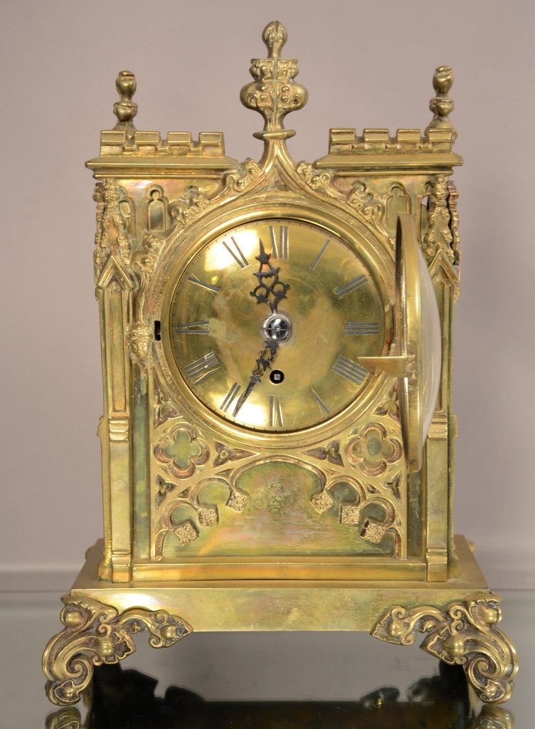 Early English Gothic Style Bracket Clock: Early English Gothic style bracket clock. Shaped finials and overlay design. Faces on front. 6" brass dial Fusee Movement. Skahespeen. ca. 1840. 16" tall x 11" wide