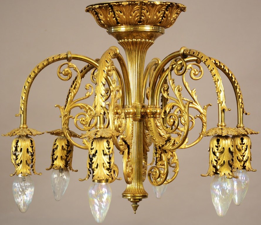French Louis XV Style Bronze Chandelier: French Louis XV style, six arm, bronze chandelier. Ribbed center with filigree arms. ca. 1920. 19" t x 23" w