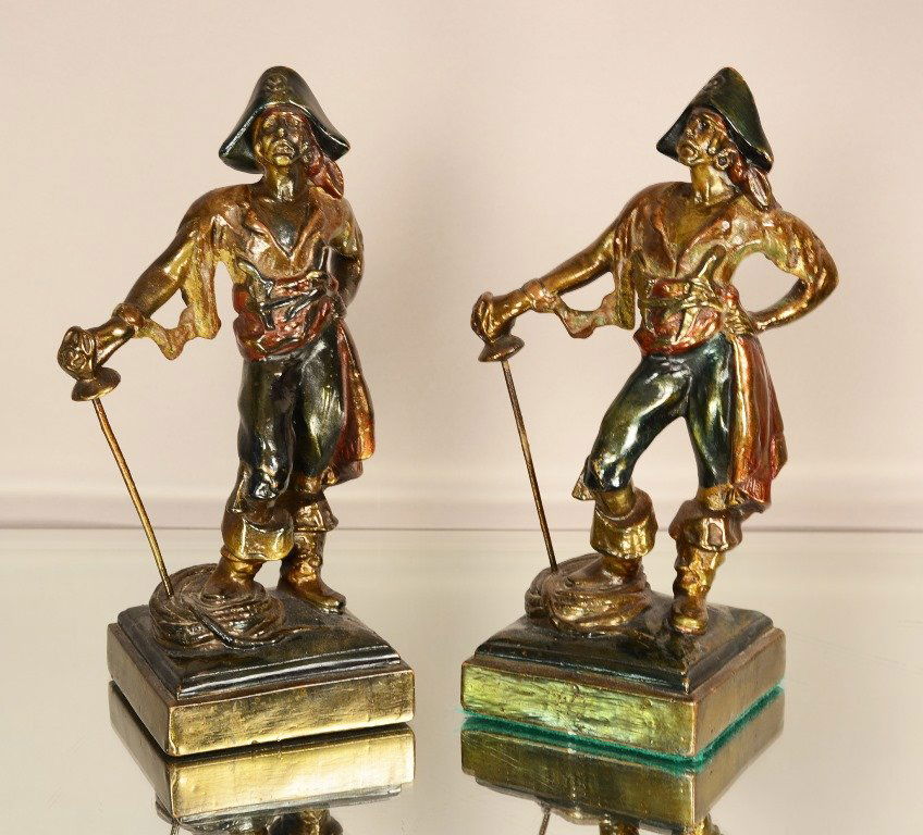 Pair of Paul Herzel Carilian Bookends: Pair of Paul Herzel Carilian copper clad bookends. ca. 1920. 10" t
