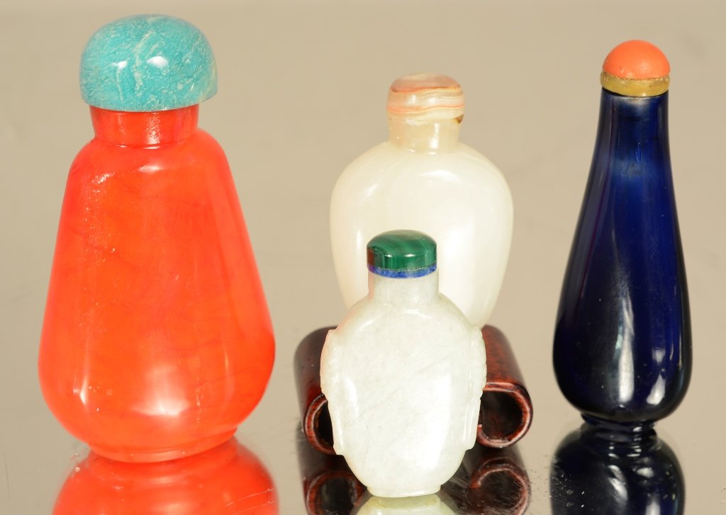 Four Chinese hard stone snuff bottles. (1 of 1)