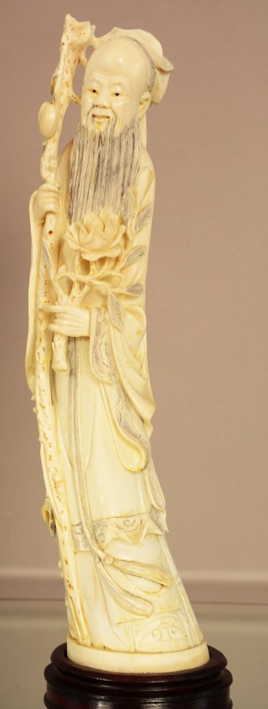 Antique Chinese Ivory statue of man. (1 of 3)