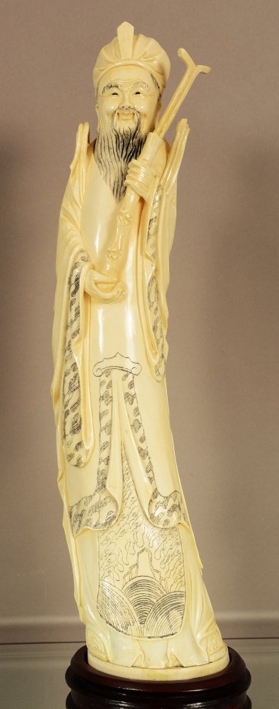 Antique Chinese Ivory statue of man. (1 of 3)