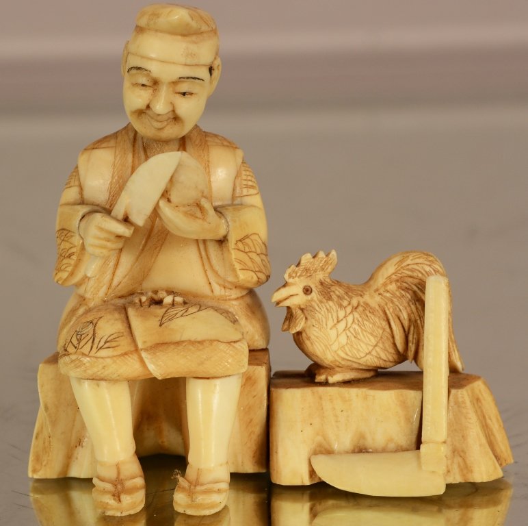 Antique Chinese Ivory figure of man and chicken. (1 of 3)