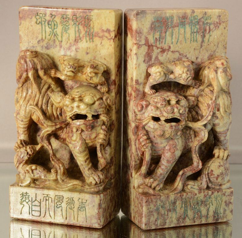 Pair of Chinese foo dog carved marble book ends. (1 of 1)