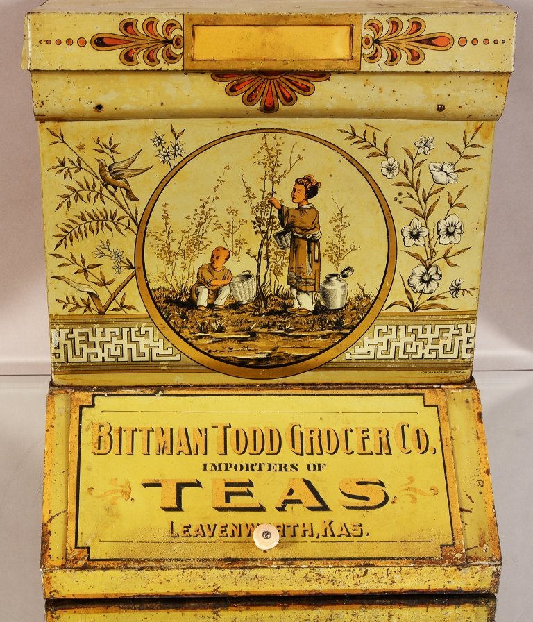 The Bittman Todd Grocer & Co. Tea: The Bittman Todd Grocer & Co. Tea Importer, tin box, ca. 1900, 16” x 16”.