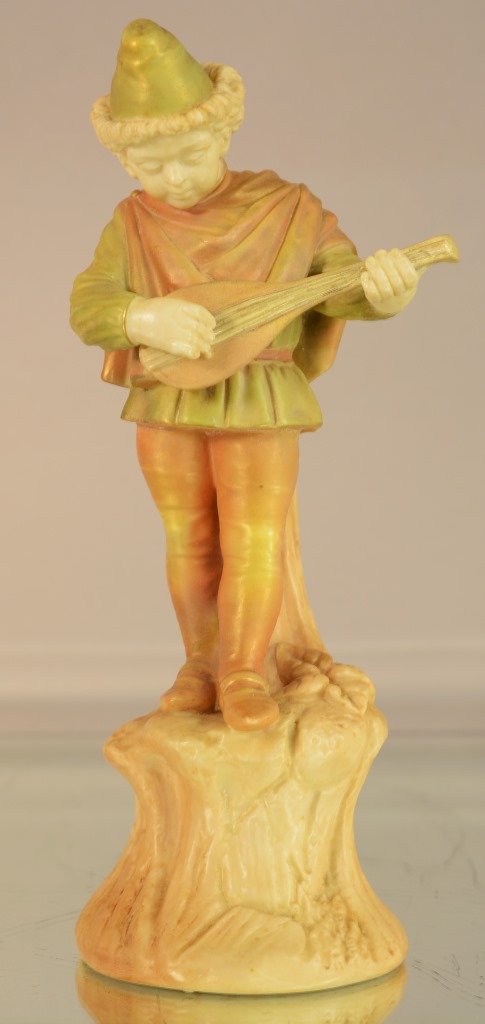 Royal Worcester statue of a boy: Royal Worcester statue of a boy playing the mandolin. RN 348939. 2071. Marked on bottom. 9”t. Ca. 1900.