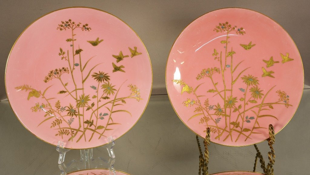Two Minton gilded & floral decorated plates: Two Minton gilded & floral decorated plates. Both plates have small hairlines. Singed on back. 9½” D. Ca. 1900.