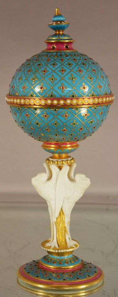 Minton compote, turquoise jeweled and gilted: Minton compote, turquoise jeweled and gilted design with pelicans mounted on center column. Lid has been repaired. Signed on bottom. Comes with glass dome. 9½”t. Ca. 1860.